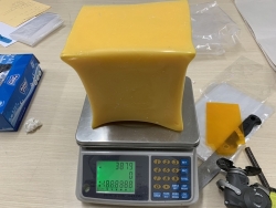HCM City Customs detect 5kg of drugs hidden inside blocks of scented candle wax